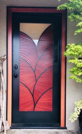 African Bloodwood Front Door, with black-stained White Oak to provide a striking contrast.
